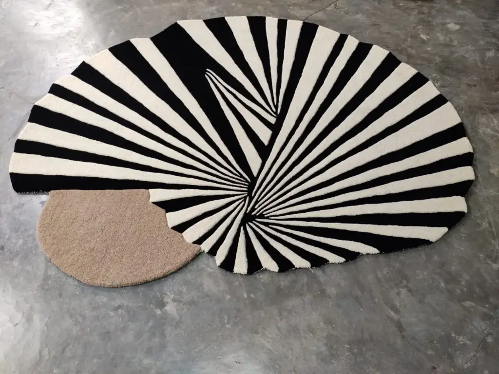 HAND TUFTED