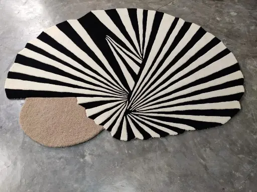 HAND TUFTED